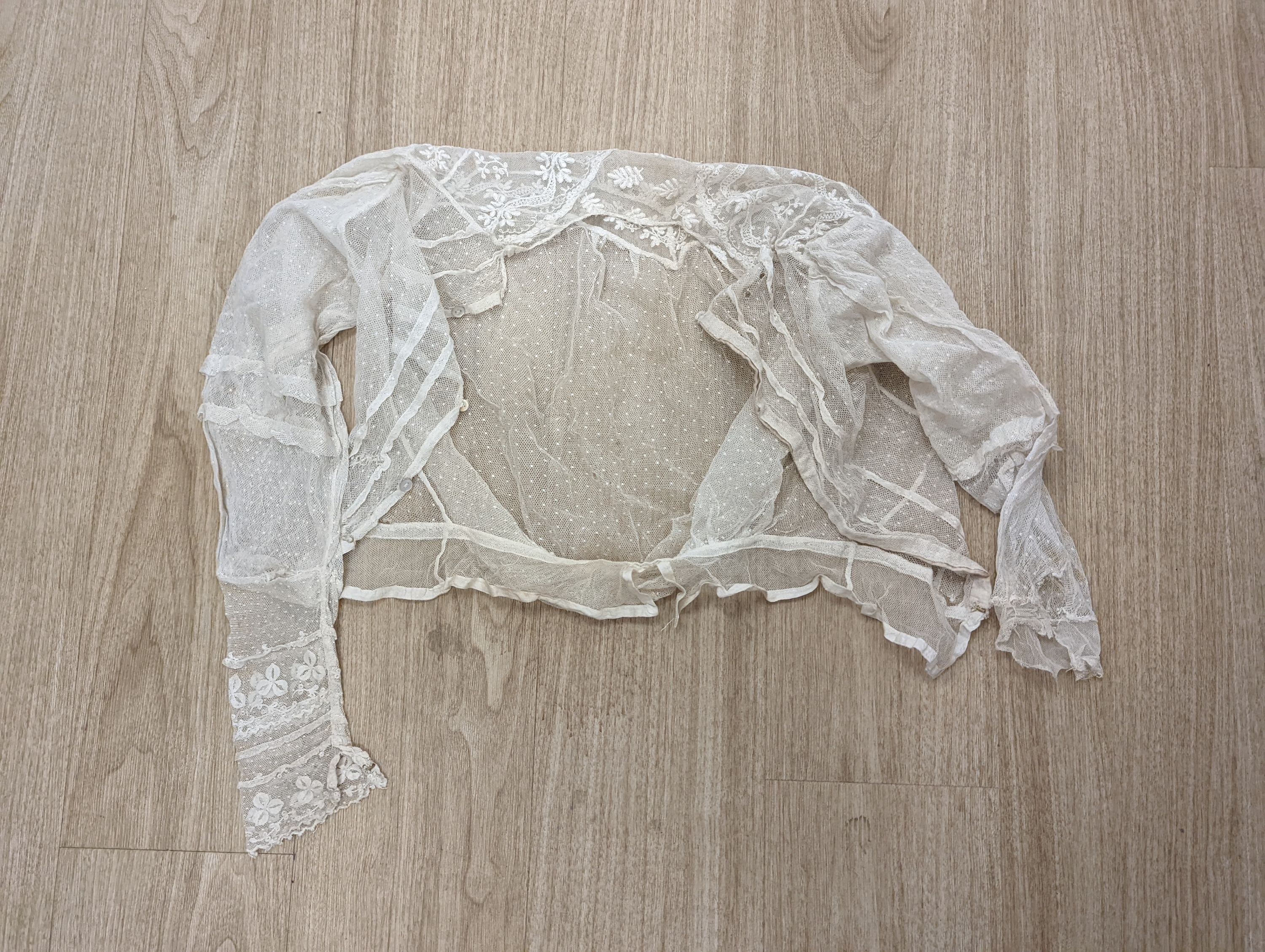 A lace jacket and five fine net and lace Edwardian ladies blouses.